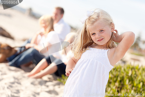 Image of Adorable Little Blonde Girl Having Fun At the Beach