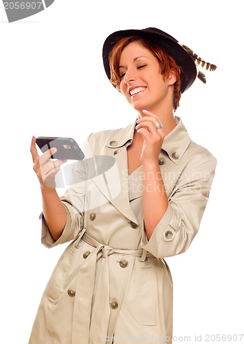 Image of Smiling Young Woman Holding Smart Cell Phone on White