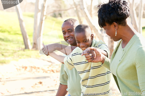 Image of Beautiful African American Family Playing Outside