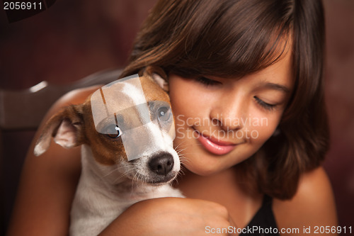 Image of Pretty Hispanic Girl and Her Puppy Studio Portrait