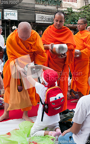 Image of Mass alms giving in Bangkok, Thailand