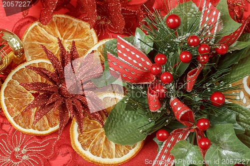 Image of christmas background with needles. orange slices and gingerbreads