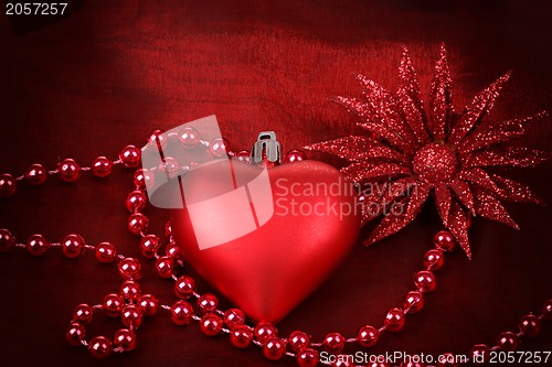 Image of valentine heart with flower on red background