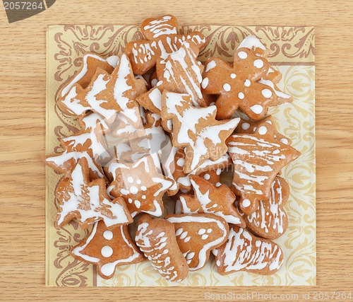 Image of christmas gingerbreads on wooden table