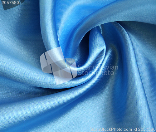 Image of Smooth elegant blue silk as background