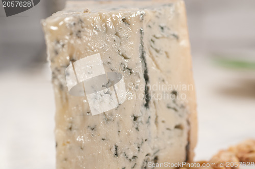 Image of gorgonzola cheese fresh cut and pinenuts