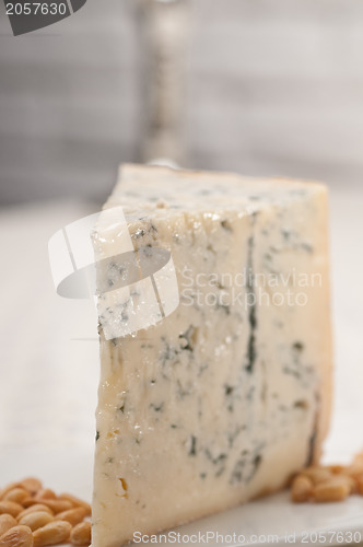 Image of gorgonzola cheese fresh cut and pinenuts