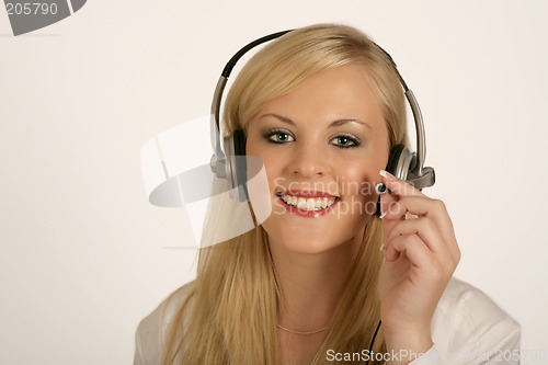 Image of Isolated sharp image of woman with headset on