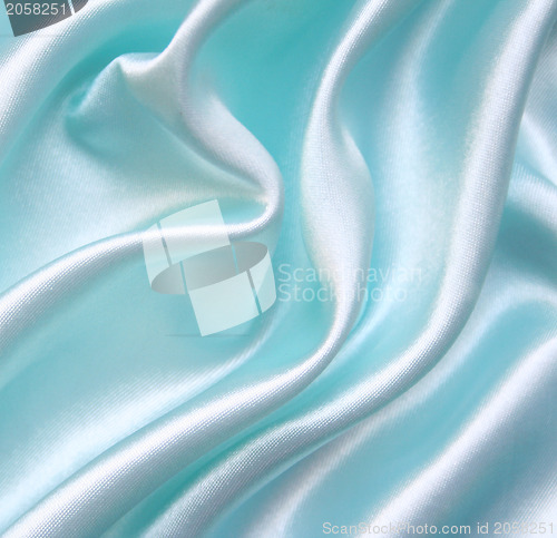 Image of Smooth elegant blue silk as background