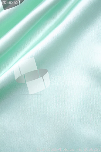 Image of Smooth elegant azure silk as background