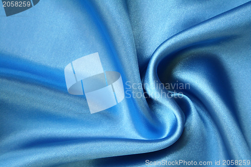 Image of Smooth elegant blue silk as background