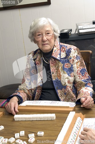 Image of senior woman at the game table