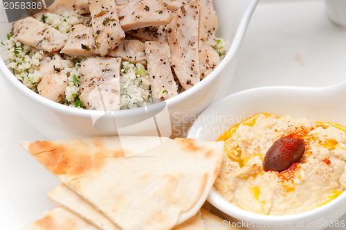 Image of taboulii couscous with hummus