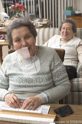 Image of senior woman at the game table