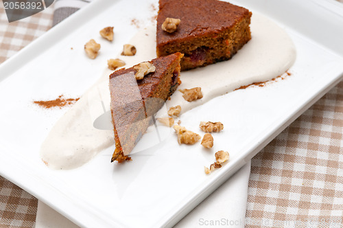 Image of fresh healthy carrots and walnuts cake dessert