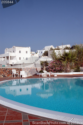 Image of hotel pool with greek island architecture