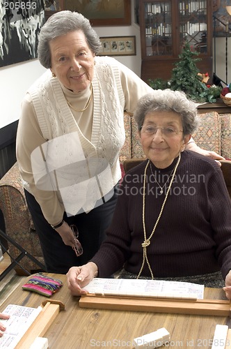 Image of senior woman at the game table