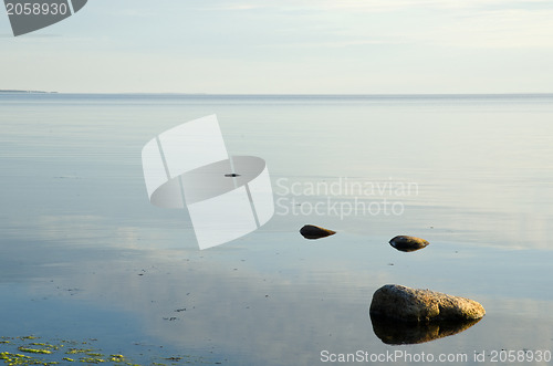 Image of Stones in calm water