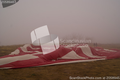 Image of Deflated balloon on the ground