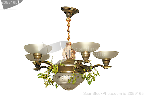 Image of old chandelier over white