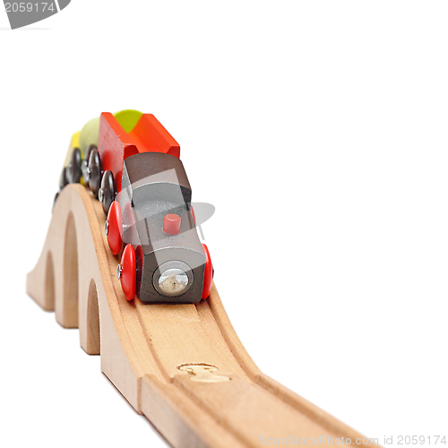 Image of wooden train on a bridge