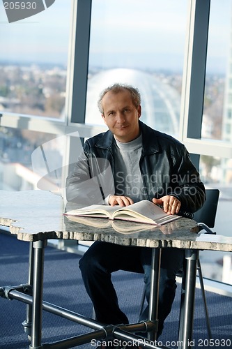 Image of Mature man in the library