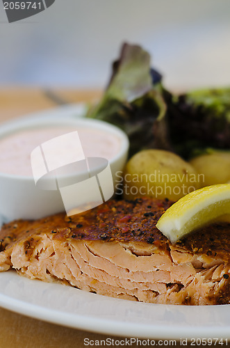 Image of Salmon fillet, potatoes and hollandaise sauce