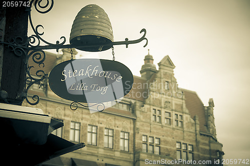 Image of MALMO, SWEDEN - CIRCA 2010: Shop sign in Lilla Torget (Small Squ