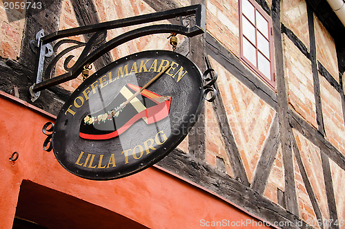 Image of MALMO, SWEDEN - CIRCA 2010: Shop sign in Lilla Torget (Small Squ