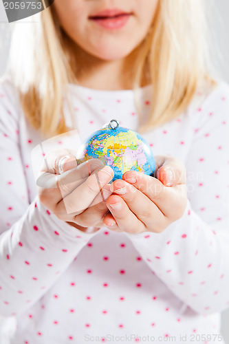 Image of Holding world in hands
