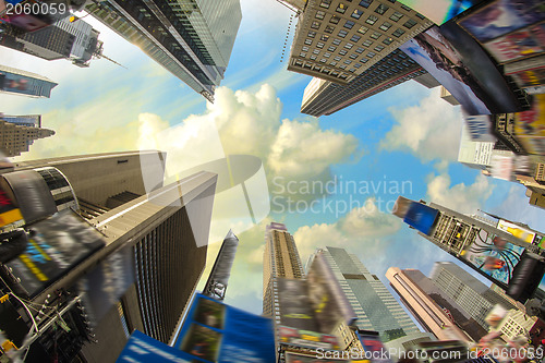 Image of Dramatic Sky above Giant Skyscrapers, fisheye view