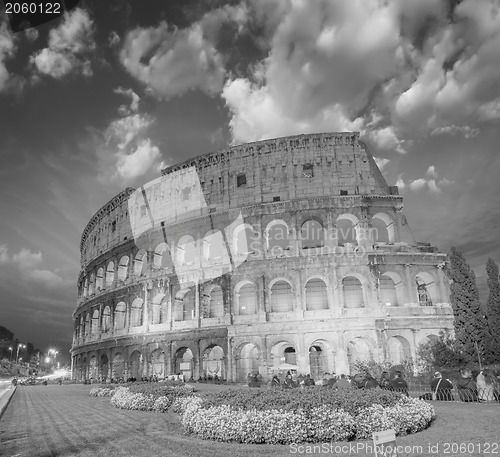 Image of Dramatic sky above Colosseum in Rome. Night view of Flavian Amph