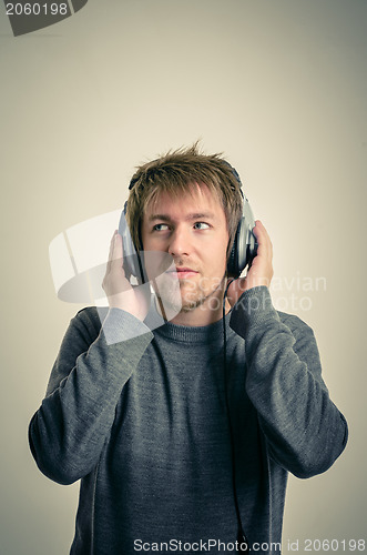 Image of Young man with headphones