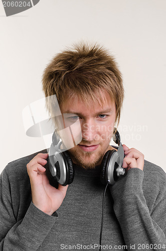 Image of Young man with headphones