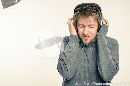 Image of Young man with headphones