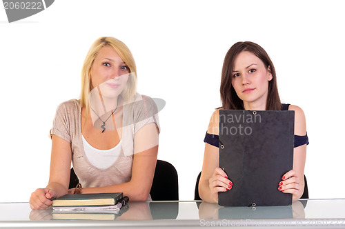 Image of Two beautiful student girls getting ready for school