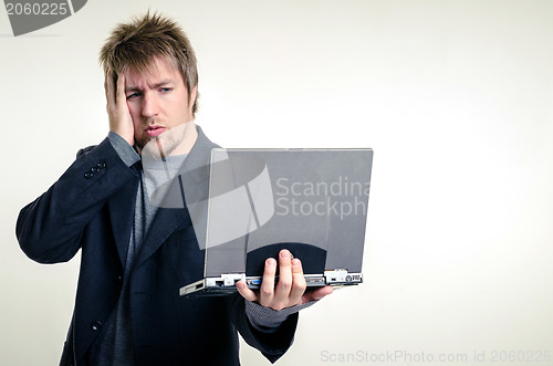 Image of Young man in business suit