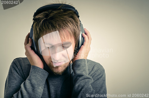 Image of Young man with headphones