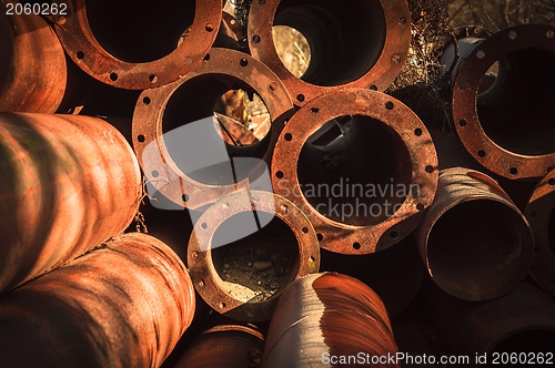 Image of Rusty old pipes stacked up