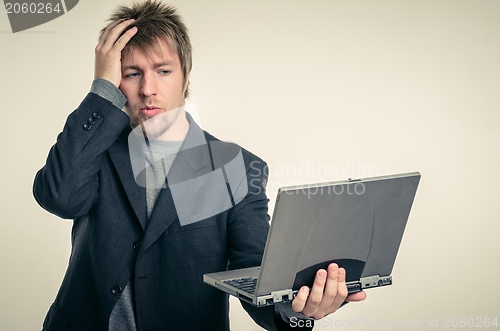 Image of Young man in business suit