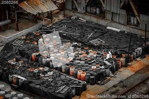 Image of Chemical waste dump with a lot of barrels
