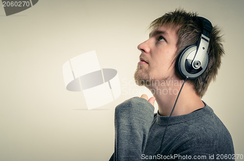 Image of Young man with headphones