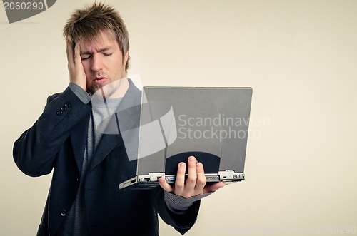 Image of Young man in business suit