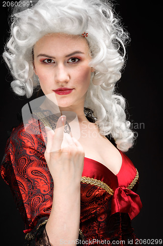 Image of Young woman in baroque custome