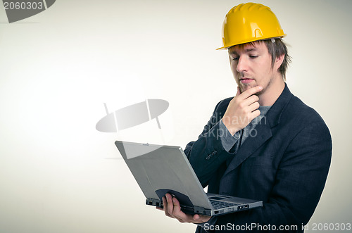 Image of Young man in business suit