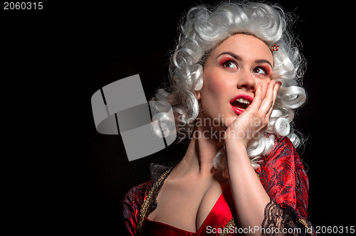 Image of Young woman in baroque costume