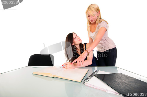 Image of Two beautiful student girls getting ready for school