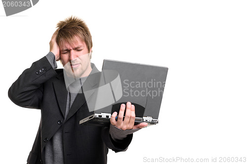 Image of Young man with laptop