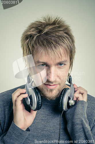 Image of Young man with headphones