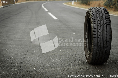 Image of Car tire on the road